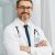 healthcare-smile-and-portrait-of-doctor-man-in-h-FQW3ASA.jpg